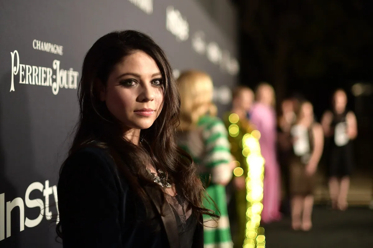 Michelle Trachtenberg poses for a photo on the red carpet in 2017