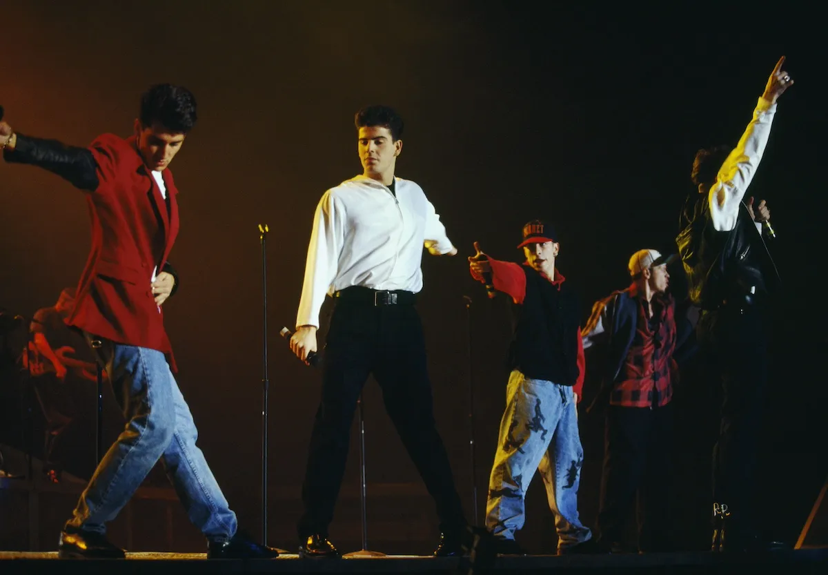 New Kids on the Block perform on stage in 1991