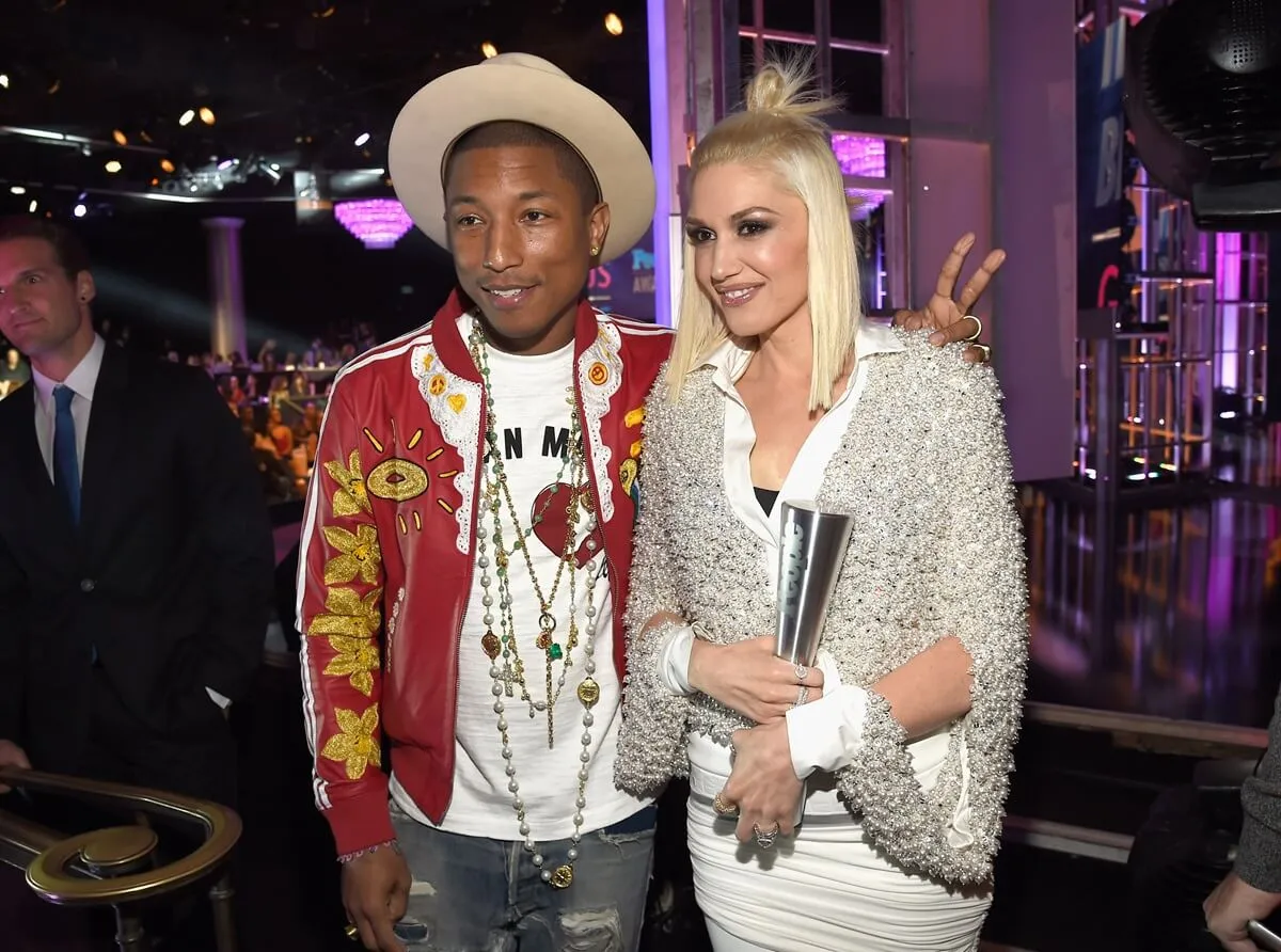 Pharrell and Gwen Stefani posing at the PEOPLE Magazine Awards.