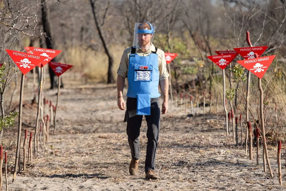 Prince Harry walking through a minefield in Dirico, Angola