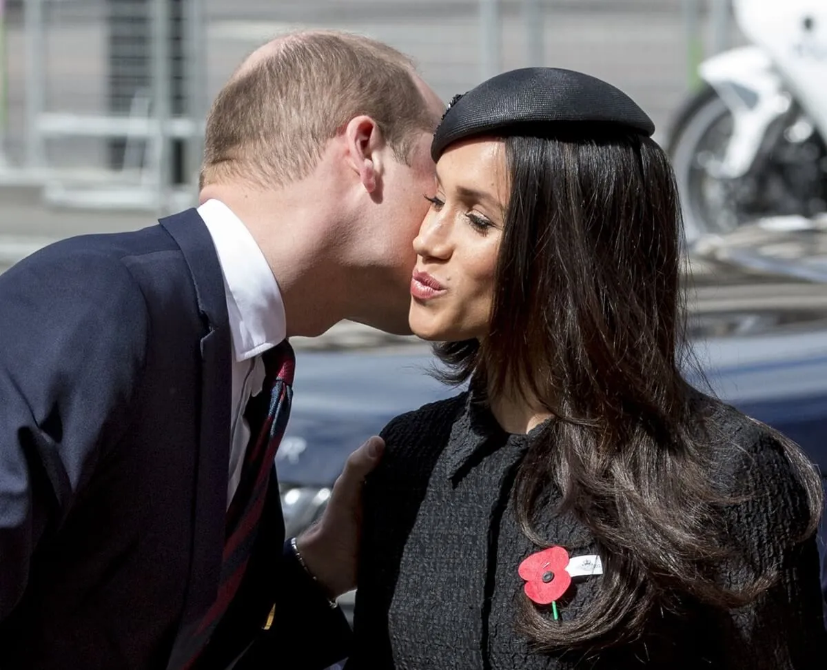 Prince William greeting Meghan Markle as they attend an Anzac Day service at Westminster Abbey