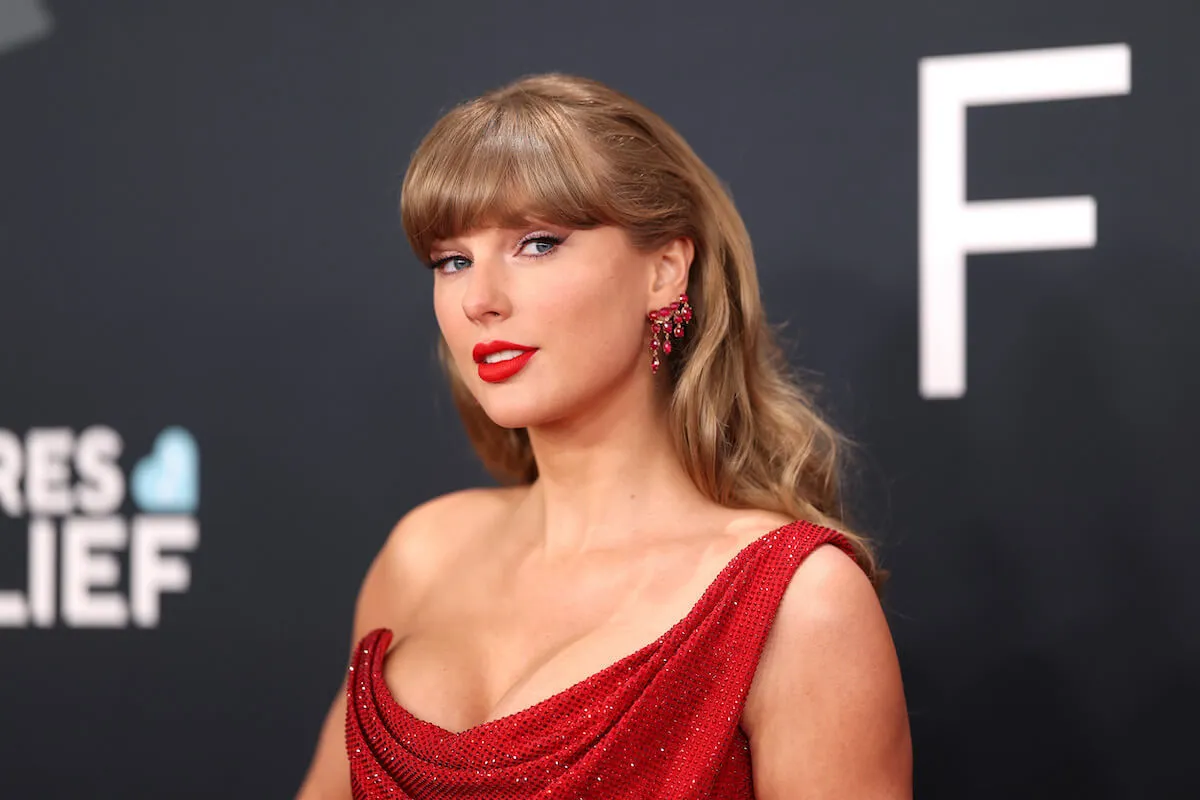 Taylor Swift, who didn't win any awards at the 2025 Grammy Awards, poses on the red carpet