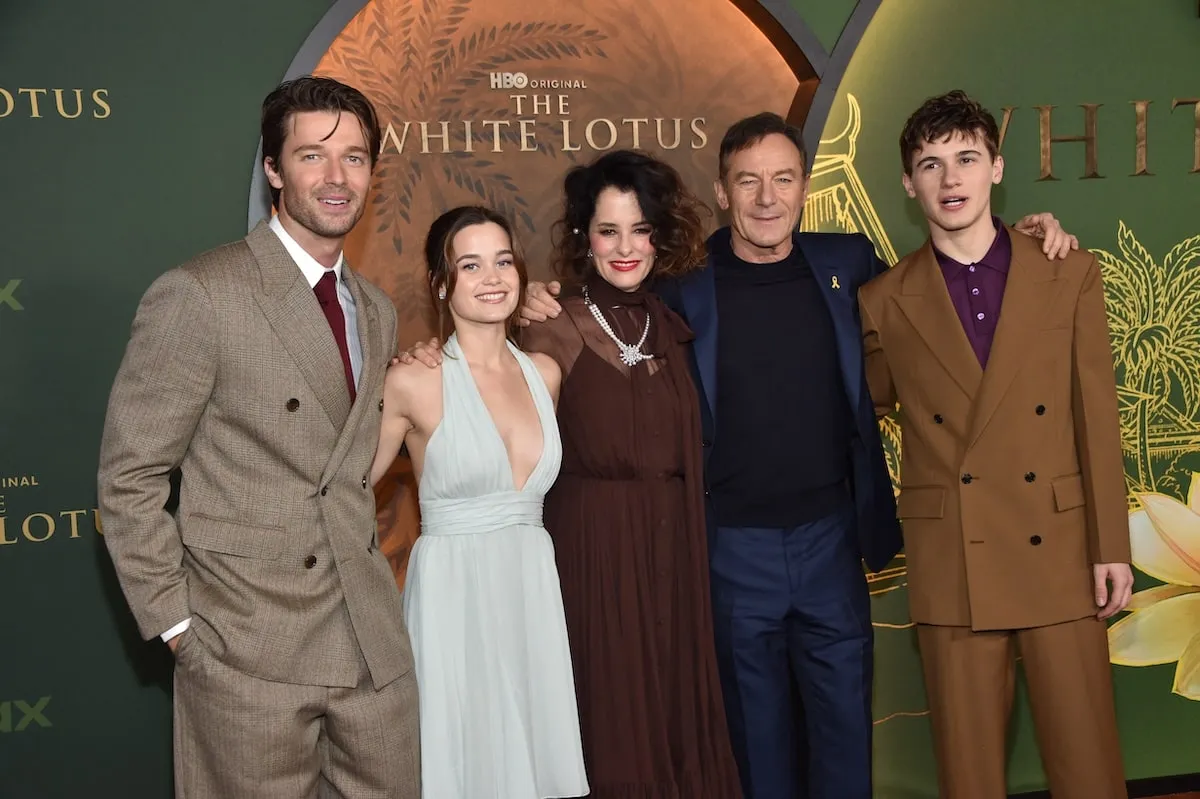 Patrick Schwarzenegger, Sarah Catherine Hook, Parker Posey, Jason Isaacs, and Sam Nivola smile on the red carpet together at the season 3 premiere