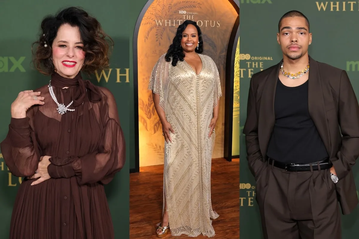 Wearing formalwear, Parker Posey, Natasha Rothwell, and Nicholas Duvernay pose on the red carpet at the premiere of season 3 of The White Lotus