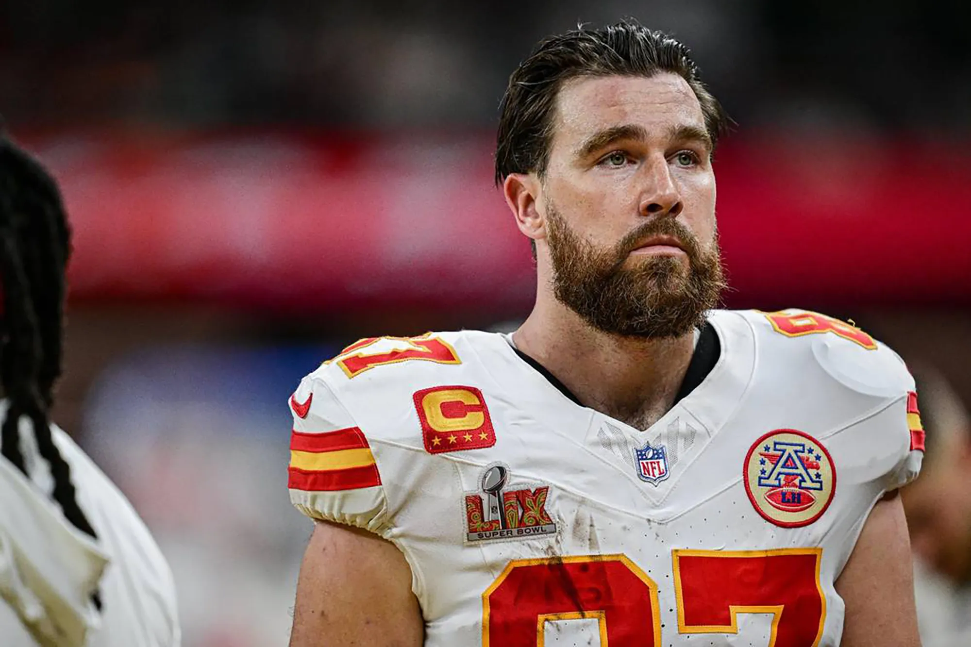 Travis Kelce looking upset in Kansas City Chiefs jersey after Super Bowl LIX loss