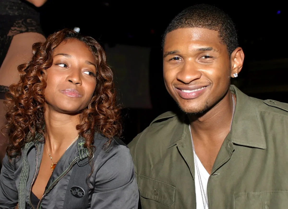 Chilli and Usher sit together at a party in 2003