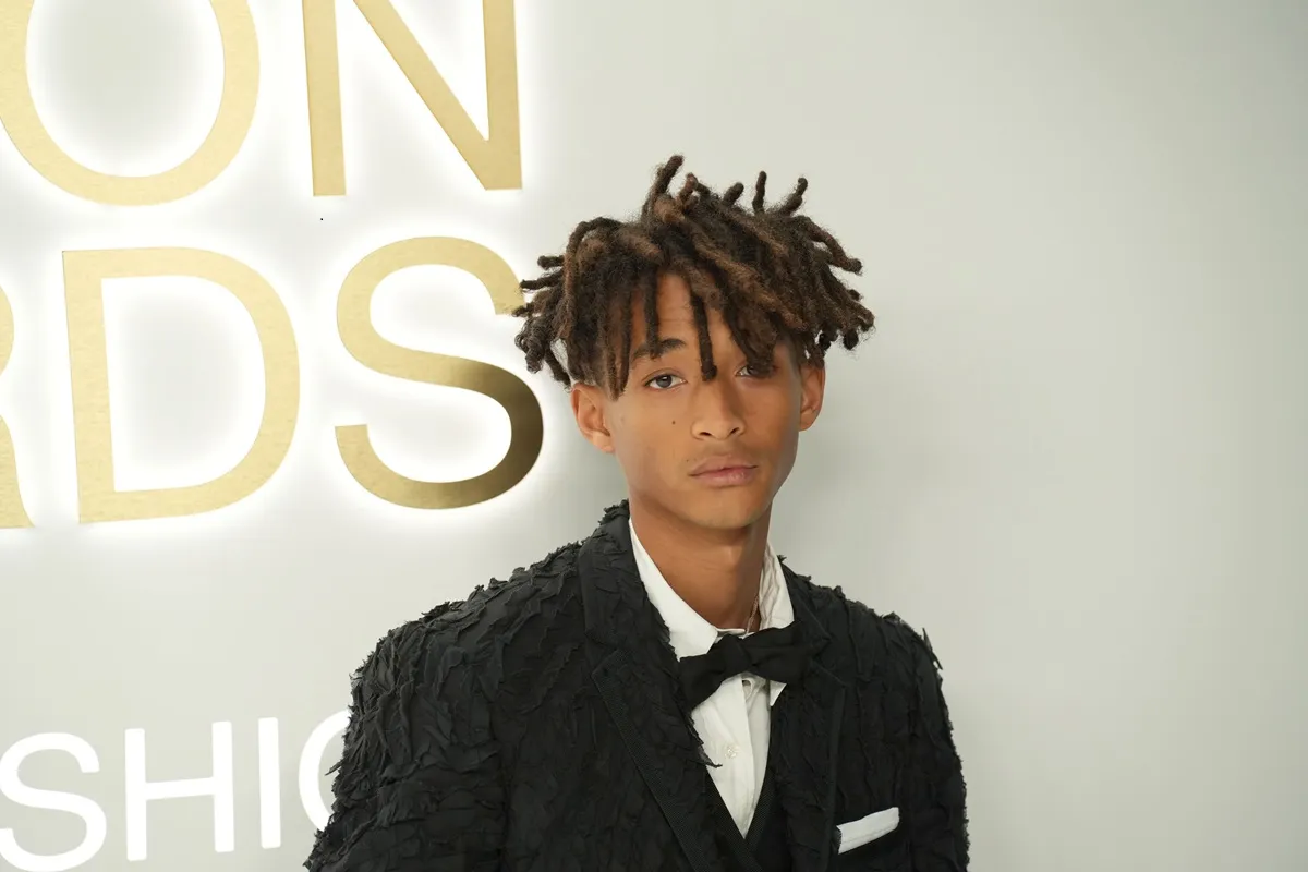 Jaden Smith posing in a bowtie and suit at the 2022 Fashion Awards Show.