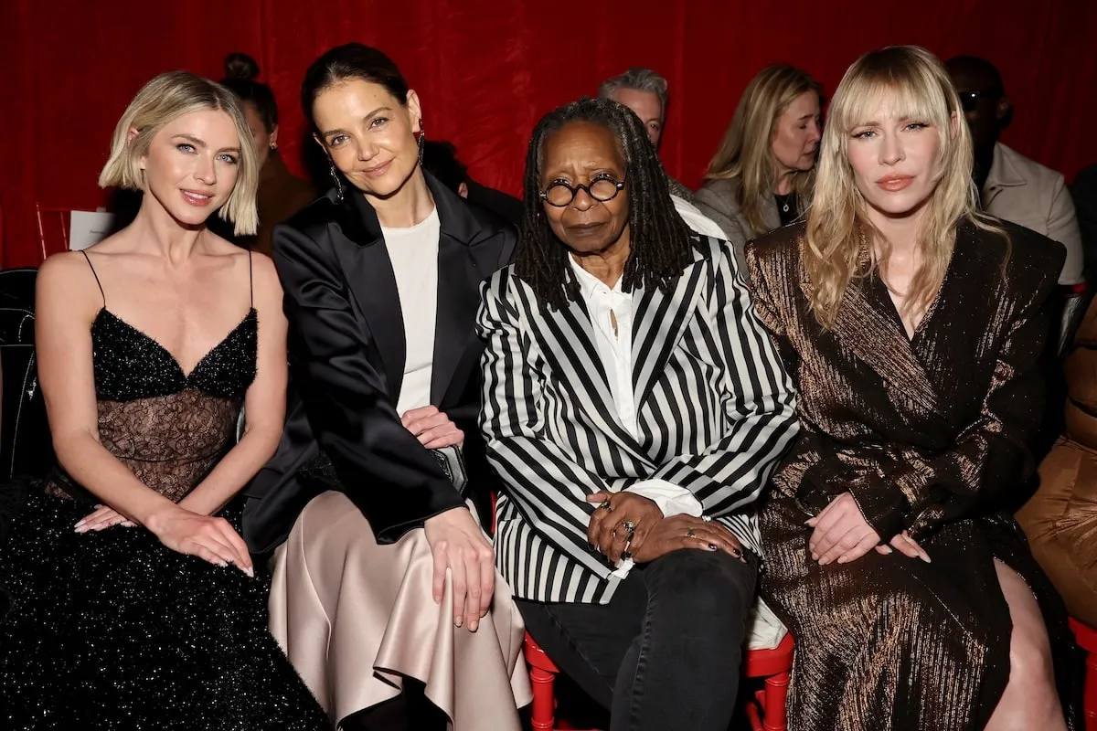 Julianne Hough, Katie Holmes, Whoopi Goldberg, and Natasha Bedingfield sit together front row at the Christian Siriano Fall/Winter 2025 runway show