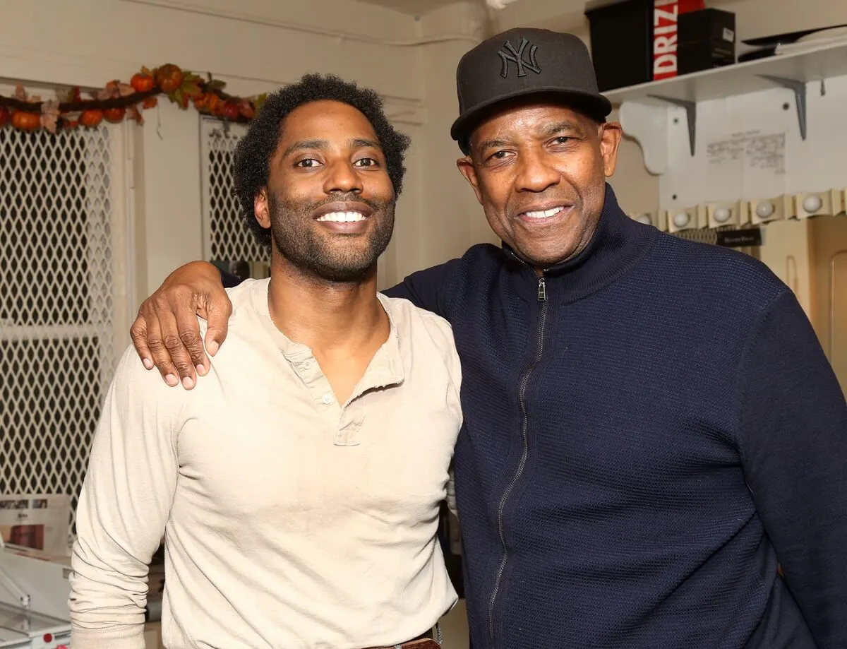 Denzel Washington posing alongside John David Washington at the Barrymore theater.