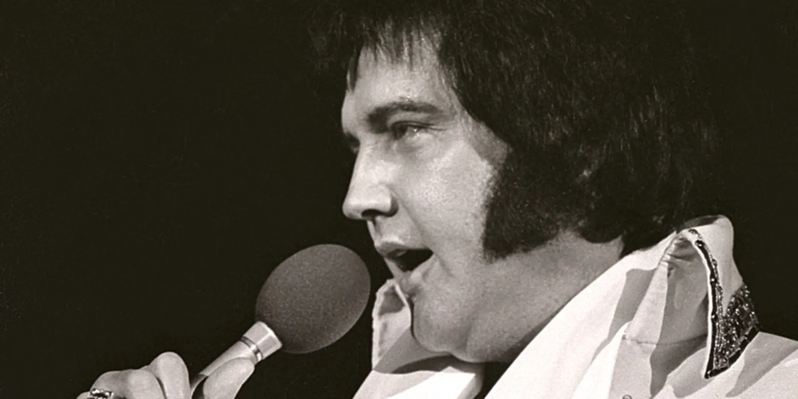 Elvis Presley photographed in concert in April 1977