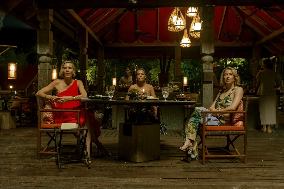 Group of three women sitting in an outdoor restaurant in 'The White Lotus' Season 3