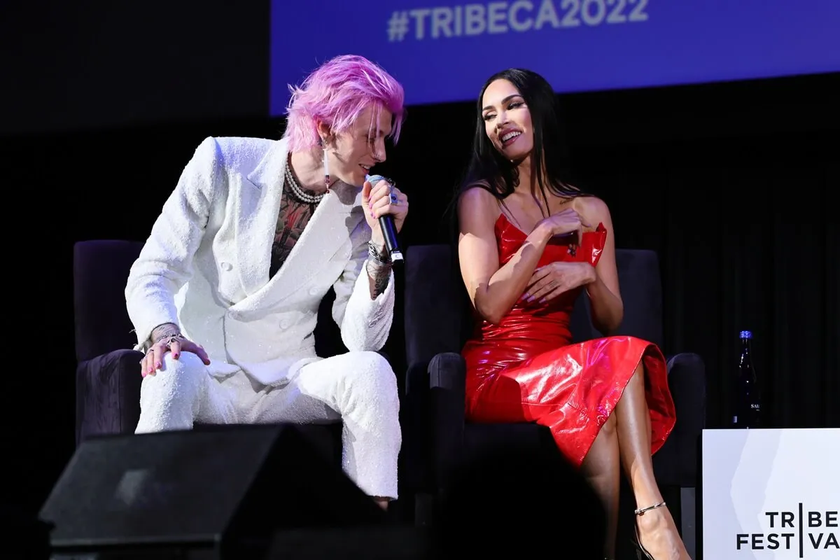 Machine Gun Kelly and Megan Fox speak onstage at the "Taurus" premiere