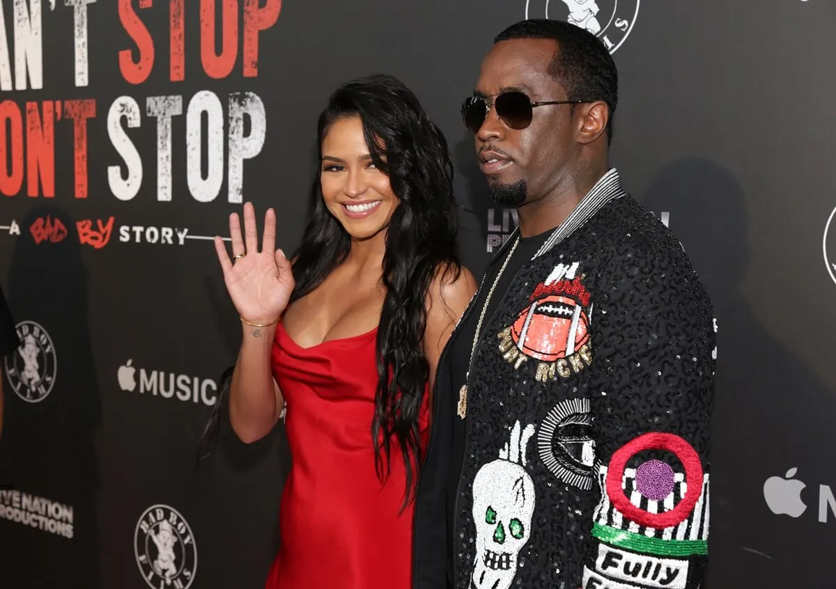 Cassie posing in a red dress alongside sean diddy combs at the Los Angeles Premiere Of "Can't Stop Won't Stop".